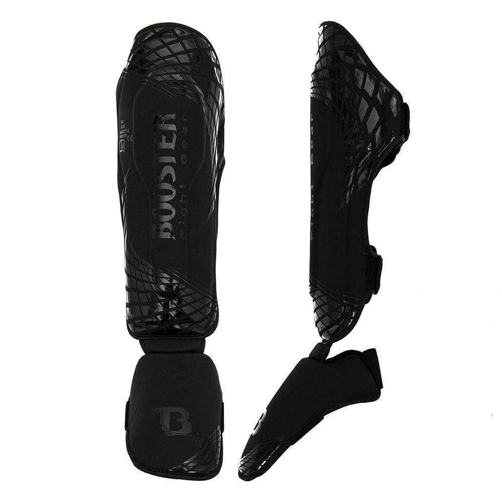 Zwarte Booster Cube scheenbeschermers van vegan leer met multi-layer foam, handgemaakt in Thailand voor kickboksen en Muay Thai